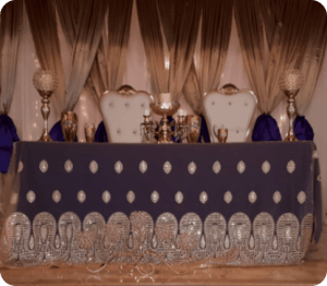 High table with a navy blue tablecloth