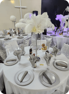 Dramatic white ostrich feather centerpiece table rental for elegant spring events in Ottawa by Decorentals2go